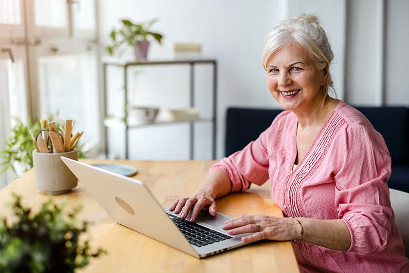 Portrait of smiling mature businesswoman working in an office